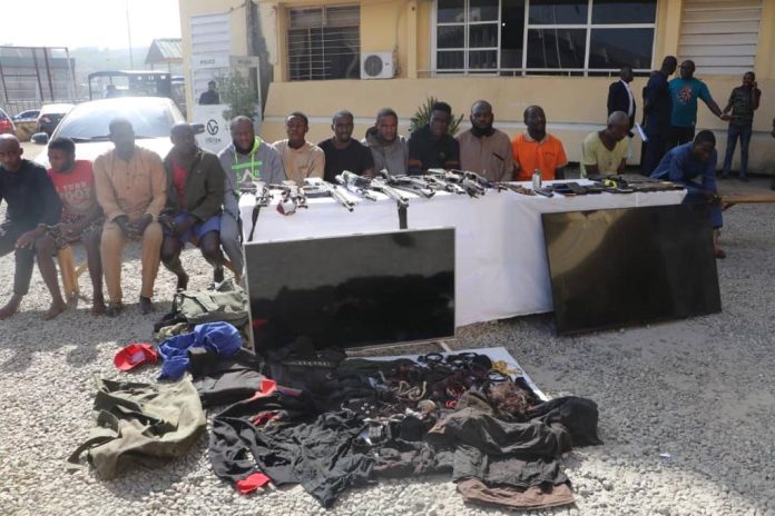 The suspects and arms recovered