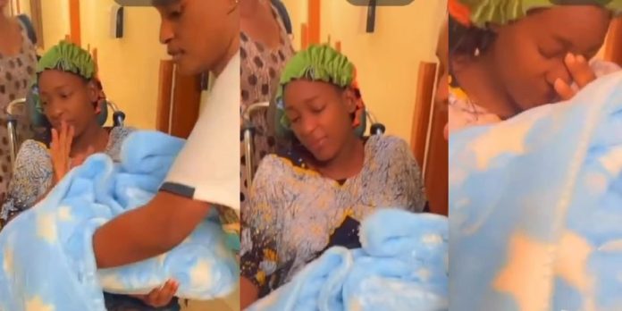 Woman refuses to hold her newborn baby following stressful labour (Video)