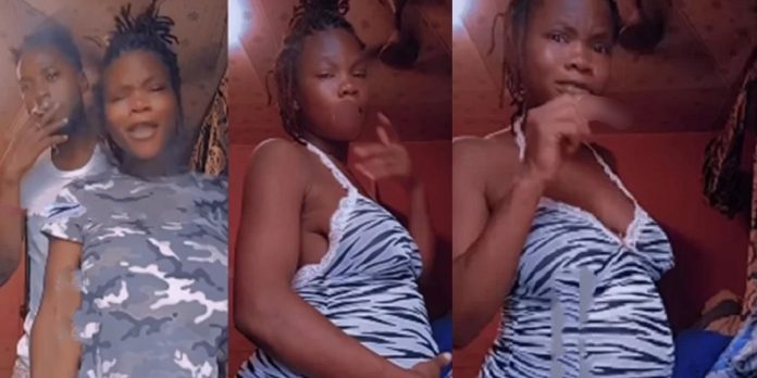 “At least pity the unborn child” – Netizens react to viral video of heavily pregnant woman joyfully smoking wɘɘd with her boyfriend (watch)