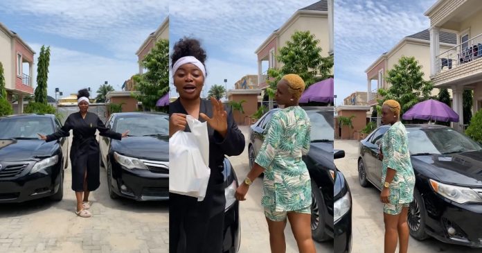 Skit-maker, Ashmusy gifts cars to her loyal workers (Video)