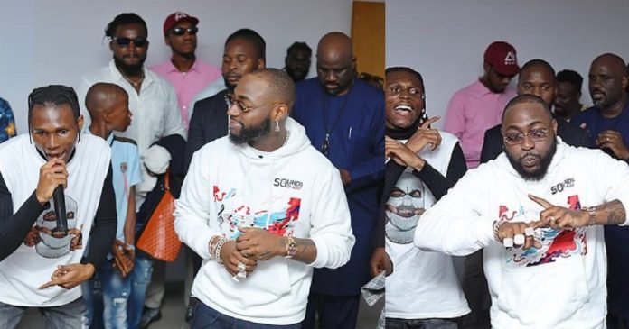 “Grace don locate this one” – Netizens react as upcoming singer impresses Davido with song at business event (Video)