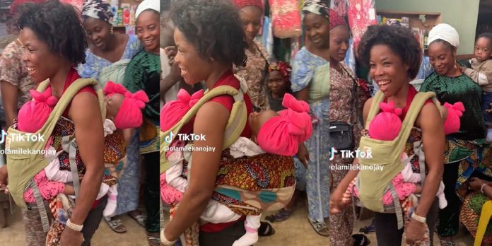 “Mothers have superpowers” – Trending video of mother carrying her triplets at once stirs reactions (Watch)