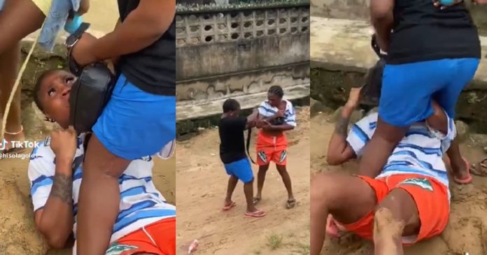 Members gang up to beat up lady who used their ‘contribution money’ to buy iPhone 13 (Video)