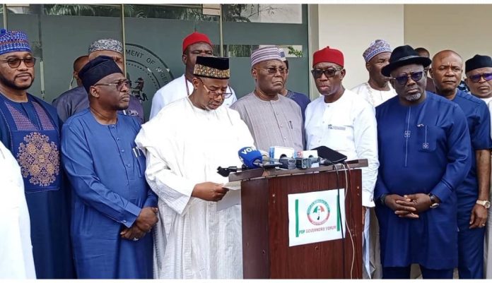 Gov Bala Mohammed (3rd from left) reading the communique of the meeting of PDP Govs, former Vice President Atiku Abubakar with the party’s National Working Committee in Abuja on Saturday