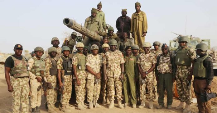Chief-of-Army-Staff-Lt.-Gen.-Tukur-Buratai-with-troops-at-Camp-Zairo-in-Sambisa-Forest