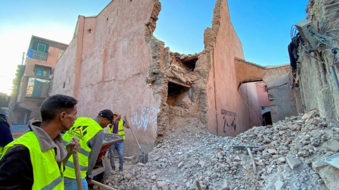 People working on the rubbles in Marrakech following an earthquake in Morocco late Friday. Photo Credit: Abdelhak Balhaki, Reuters