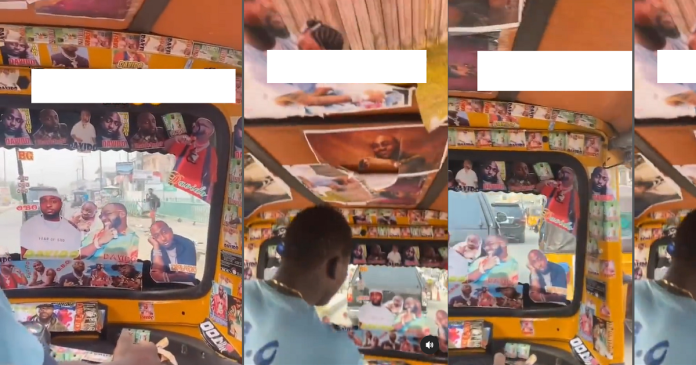 Best in fan! Keke Napep rider decorates his tricycle with every Davido sticker there is (VIDEO)