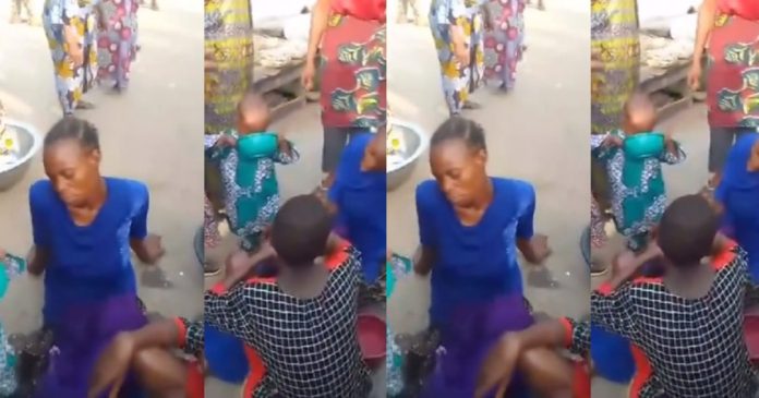Local Traders Rally Around To Show Their Support As A Widow Faints From Hunger While Selling Pure Water (VIDEO)