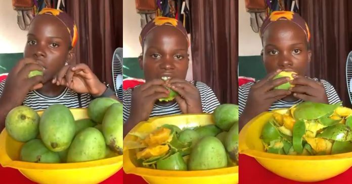 Lady shocks the internet with heap of Mango fruits she finished in one sitting (VIDEO)