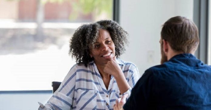 A Nigerian mother conducts an interview session for her daughter's suitor