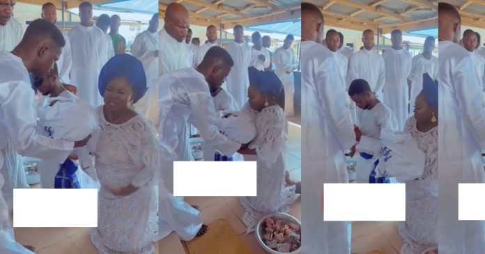 Moment mother of newborn baby speaks in tongues while dedicating her child in church (VIDEO)