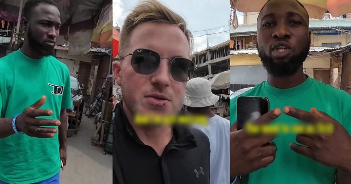 The moment an Agbero tried to extort money from a Caucasian Vlogger (VIDEO)