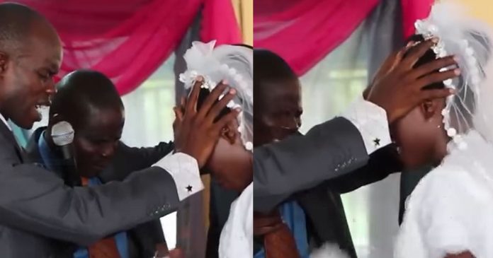 Video Of Groom Passionately Praying And speaking In Tongues Over His Bride At Their Wedding Stirs Reaction Online (VIDEO)