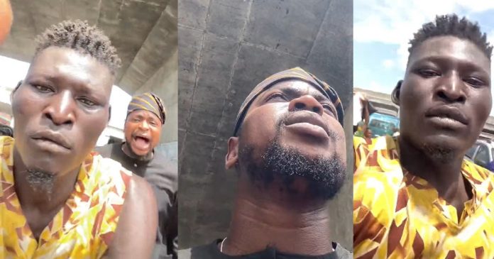 Moment an agbero snatched a phone from a vlogger who was recording and asked him to pay before getting it back (VIDEO)