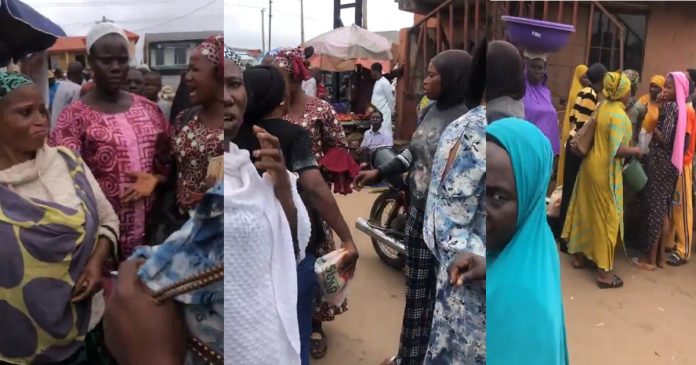 Market women angr!ly gathered and stormǝd colleague's shop that sells Garri at a cheap price (WATCH)