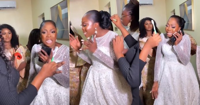 Video of Nigerian Bride Overwhelmed With Prǝssure On Her Wedding Day Stirs Reactions Online (WATCH)