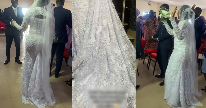 Bride reduces long wedding dress train after her church claimed it was s3ductive (VIDEO)