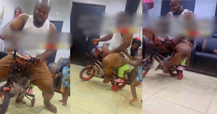 Nigerian man rides a bicycle with children, shows off paternal love (VIDEO)