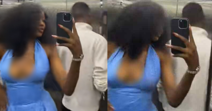 "Please act like my partner" – Lady requests waiter's help in taking f@ke couple selfie in an elevator (WATCH)
