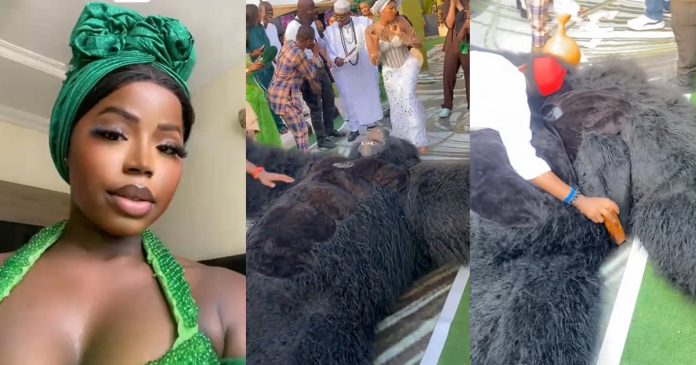 Lady stúnned after the person in a gorilla costume fa!nted while entertaining guests at a wedding (VIDEO)