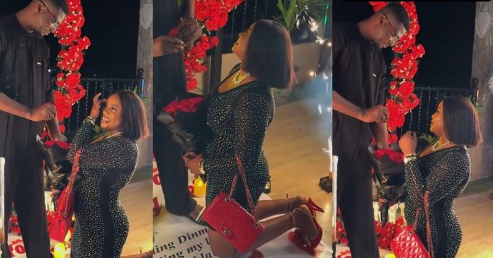 "You are next in line" – Nigerian lady shows sign of a good wife, kneels to accept an engagement ring from her partner (WATCH)