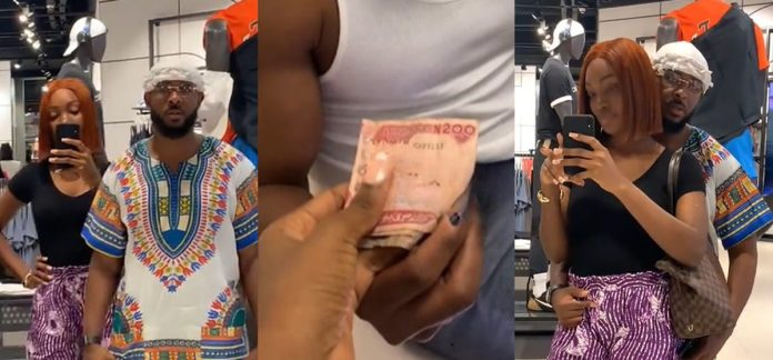 Heartwarming moment lady tr!cks her partner using Nigerian currency (WATCH)
