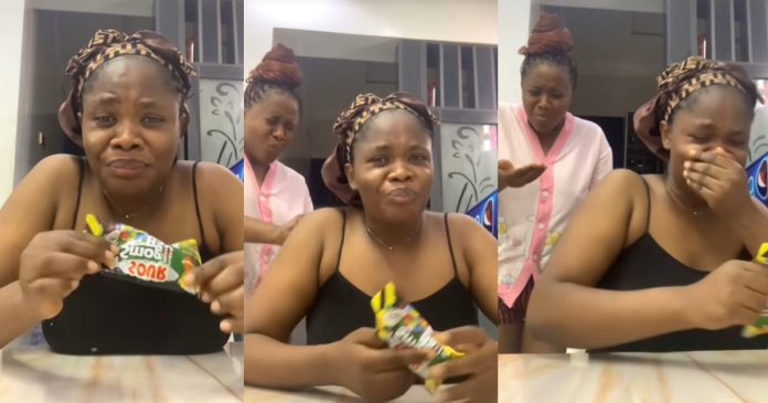 "Next time she will not beg again" – Hilarious moment a lady teaches her sister a lesson with sour candy (WATCH)