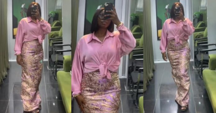 "I didn't spend so much money on fabric for it to sit in my wardrobe for one year" – Lady says as she wears an Aso-Ebi skirt to work (WATCH)