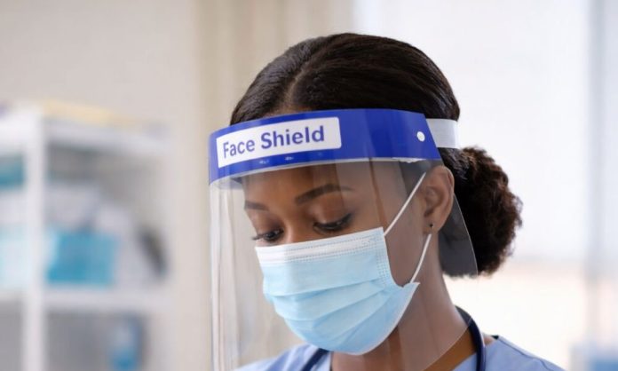 Doctor-in-PPE-preparing-medication-e1771323761534-1000x600.jpg