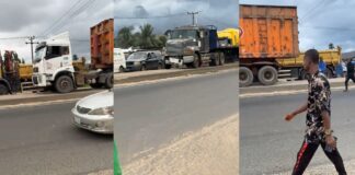 Panic as two heavy trucks drive on pavement to beat gridlock on major road (Watch) Panic as two heavy trucks drive on pavement to beat gridlock on major road (Watch)